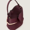 Bolsita Pinch Me de piel napa
