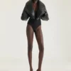 Mules de tacón Boudoir en charol con flecos Mules de tacón Boudoir en charol con flecos