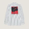 Camisa a rayas de popelín con estampado surrealista Camisa a rayas de popelín con estampado surrealista