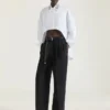Camisa asimétrica de popelín con lentejuelas Camisa asimétrica de popelín con lentejuelas
