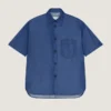 Camisa con costuras de alta costura en denim azul índigo con sello de Givenchy