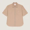 Camisa con cremallera y costuras de alta costura
