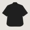 Camisa con cremallera y costuras de alta costura