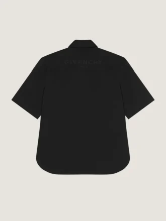 Camisa con cremallera y costuras de alta costura