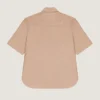 Camisa con cremallera y costuras de alta costura