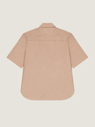 Camisa con cremallera y costuras de alta costura