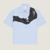 Camisa de popelín con estampado surrealista