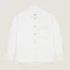 Camisa oversize con costuras de alta costura en denim blanco