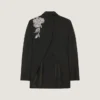 Chaqueta cruzada con aberturas en lana y lentejuelas Chaqueta cruzada con aberturas en lana y lentejuelas