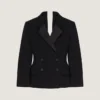 Chaqueta de esmoquin de doble botonadura con aberturas, confeccionada en lana Chaqueta de esmoquin de doble botonadura con aberturas, confeccionada en lana