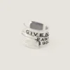 Earcuff Tape de Givenchy en metal y esmalte Earcuff Tape de Givenchy en metal y esmalte