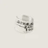 Earcuff Tape de Givenchy en metal y esmalte Earcuff Tape de Givenchy en metal y esmalte
