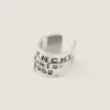 Earcuff Tape de Givenchy en metal y esmalte Earcuff Tape de Givenchy en metal y esmalte