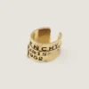 Earcuff Tape de Givenchy en metal y esmalte