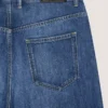 Jeans azul oscuro con costuras de alta costura