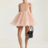 Mini vestido babydoll con volantes de nylon Mini vestido babydoll con volantes de nylon
