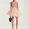 Mini vestido babydoll con volantes de nylon Mini vestido babydoll con volantes de nylon