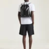 Mochila Antigona estampada en piel de becerro granulada brillante