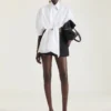 Mules con tacón de cinta en piel Mules con tacón de cinta en piel