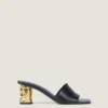 Mules con tacón de cinta en piel Mules con tacón de cinta en piel