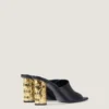 Mules con tacón de cinta en piel Mules con tacón de cinta en piel