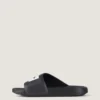 Mules con tiras de la línea Label en caucho