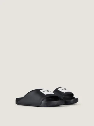Mules planos Label de goma
