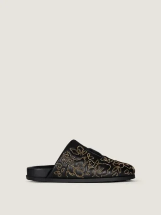 Mules planos Label en piel con tachuelas