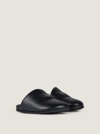 Mules planos Label en piel napa