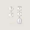 Pendientes asimétricos con púas y perlas en metal y perlas Pendientes asimétricos con púas y perlas en metal y perlas