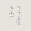 Pendientes asimétricos con púas y perlas en metal y perlas Pendientes asimétricos con púas y perlas en metal y perlas