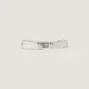 Pulsera tipo brazalete Givenchy Tape en metal y esmalte
