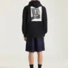 Sudadera con capucha de felpa con costuras de alta costura y estampado de claqueta