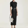 Vestido polo midi de punto con efecto segunda piel